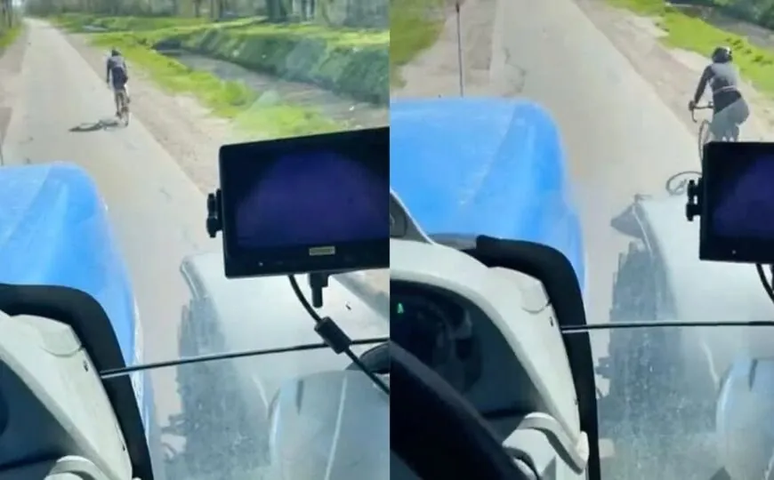 Rennradfahrer bekommt unfreiwillige Staubdusche – Traktor sorgt für Wirbel
